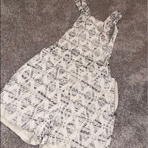 White and black shorts overalls